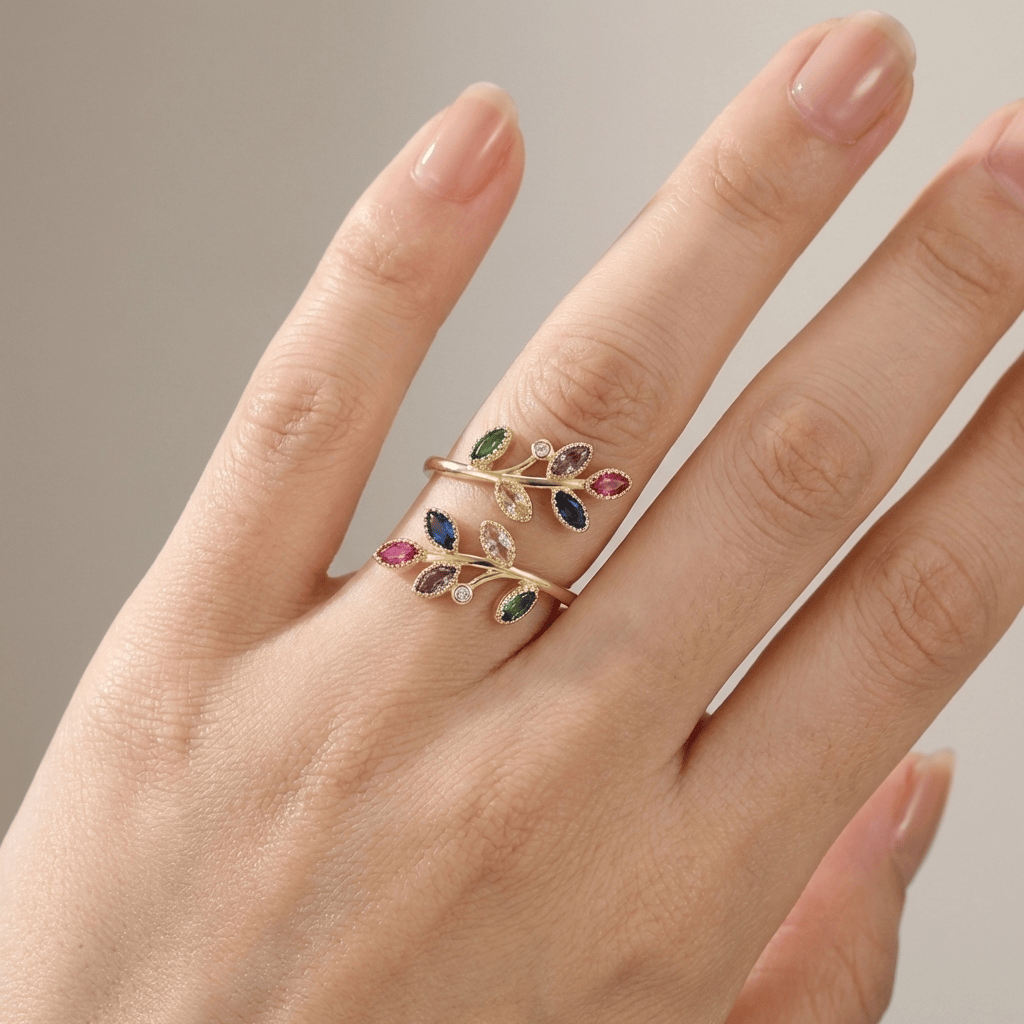 Lindad guldring med löv – justerbar