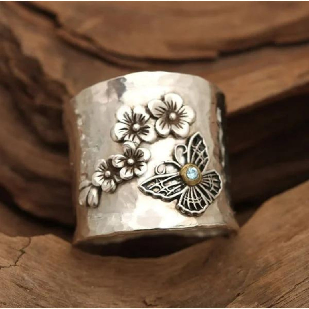 Bred ring med bi, blomma och fjäril