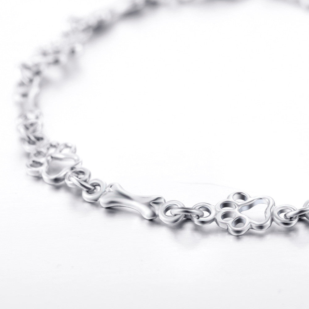Begränsad upplaga Ren Silver Hund Tass och Ben Berlocker Armband