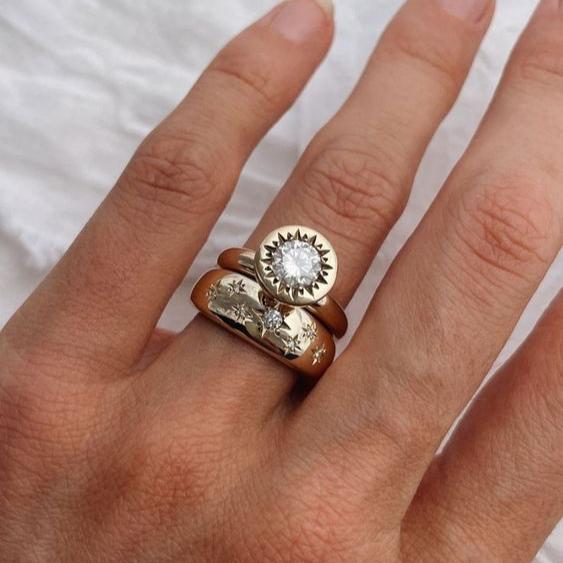 Ringset i vintagestil med lysande stjärna