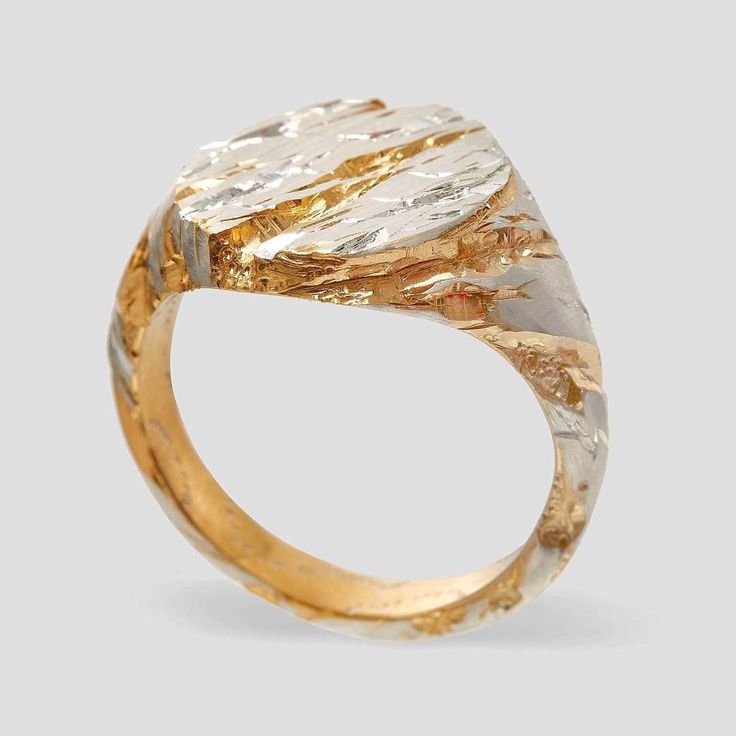 Vintagering i guld och silver med antik känsla