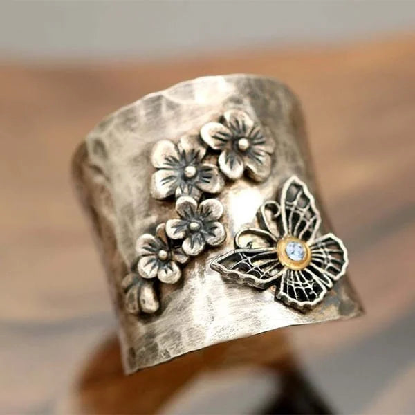 Bred ring med bi, blomma och fjäril