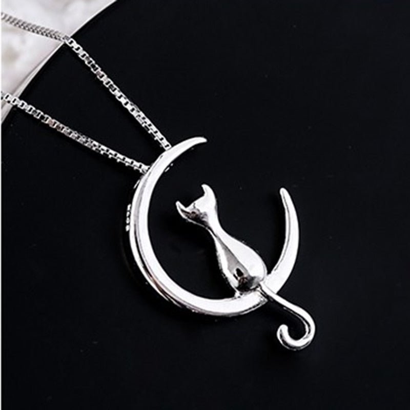 Elegant katt-halsband med halvmåne och katt