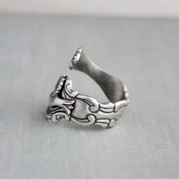 Ring med kolibri och blomma