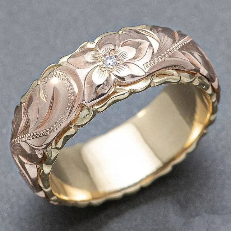 Guldring i vintagestil med rosblomma